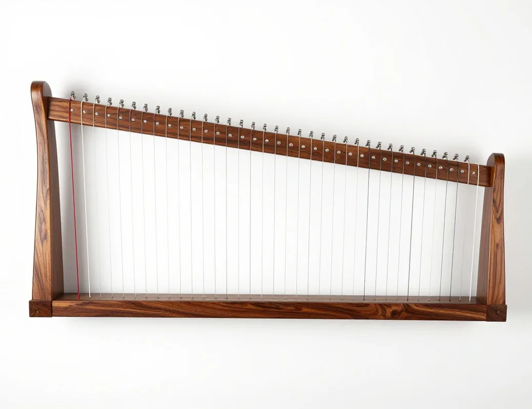 Large 25 string table gusli in walnut wood with steel tuning pins seen from above